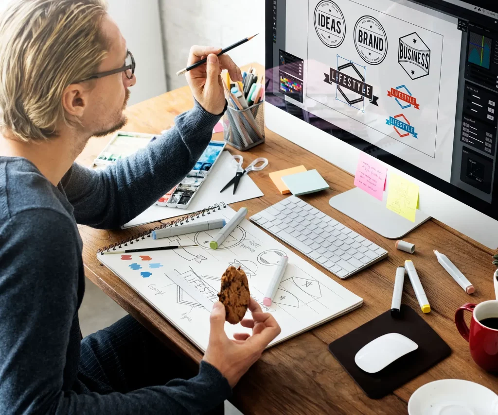 Professional reviewing logo on screen. Manufacturing strategy, asset value, and innovation.